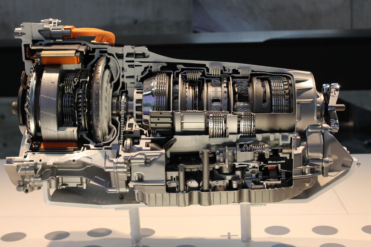 Cutaway of an automatic transmission showing gear sets and clutch packs
